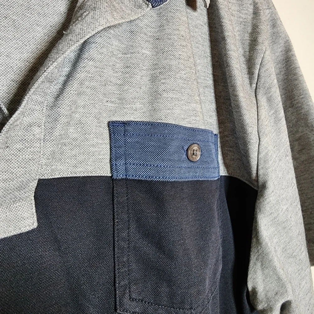 Travis Mathew Four B's Polo.‎ Grey navy blue. Men's size Large.